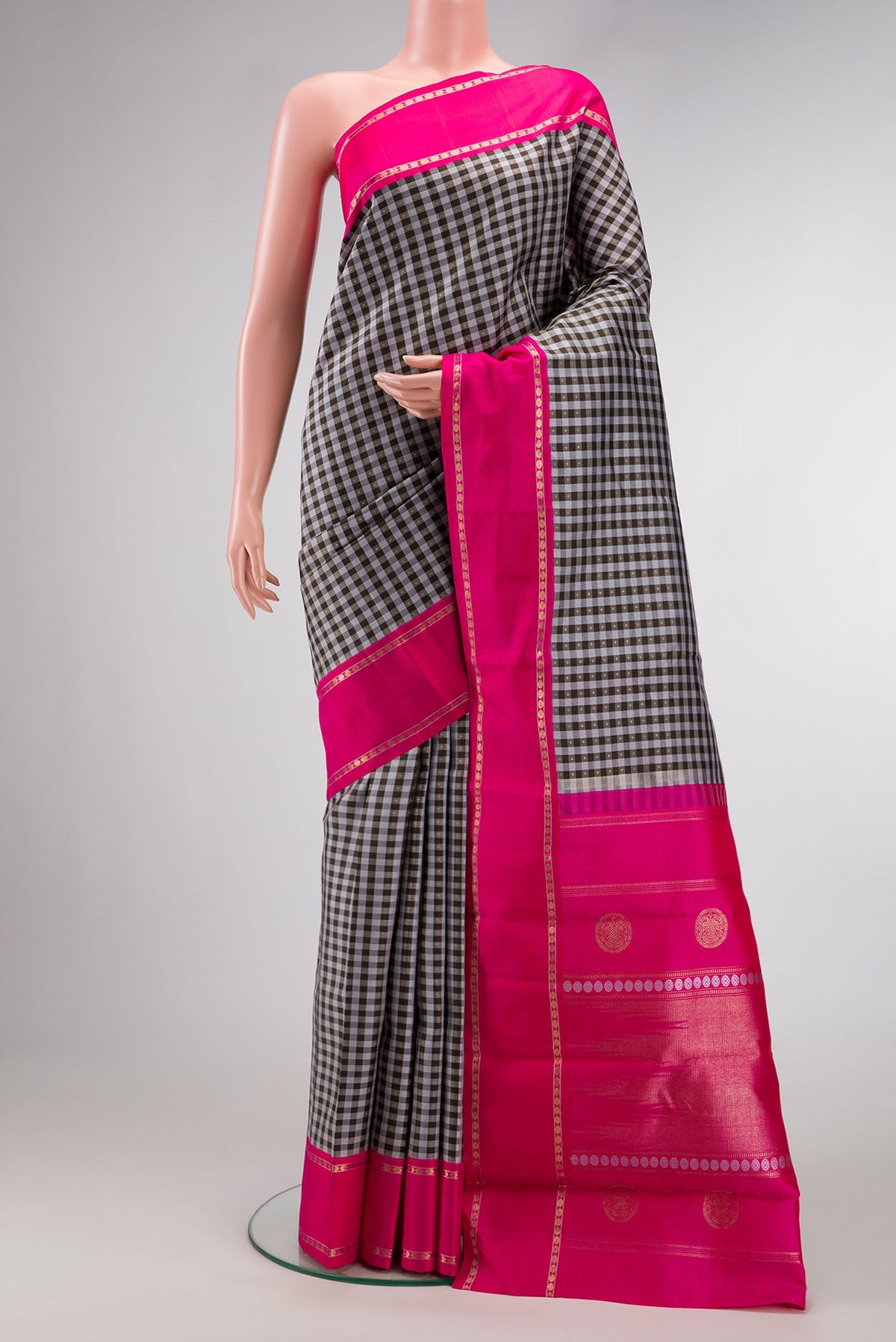 Pure Silk Pure Zari Grey Dual Tone Kanjivaram Saree with Checked design on the body and Zari Border.  displayed on a mannequin