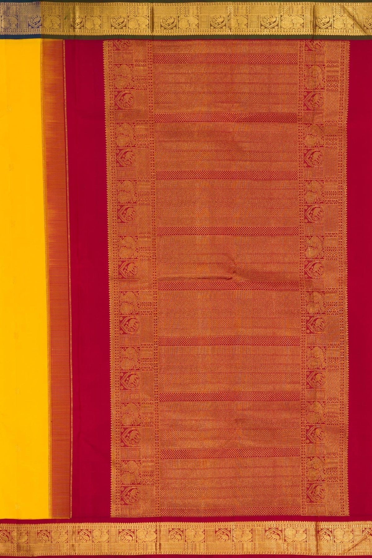 Close up image of the pallu of Yellow Dual Tone Kanjivaram Silk Saree with Zari Butta on the body and Ganga Jamuna Border. 