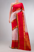 Pink Dual Tone Kanchipuram Silk Saree with Checked design on the body and Zari Border.  displayed on a mannequin