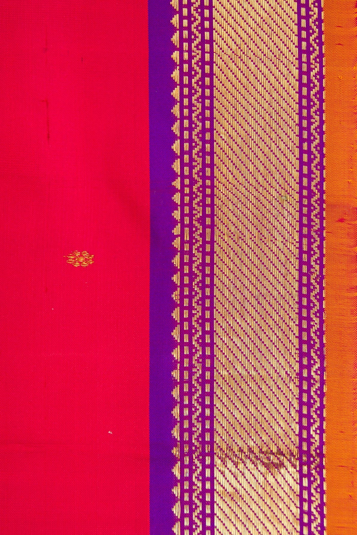 Border image of Red Dual Tone Kanchipuram Silk Saree with Zari Butta on the body and Zari Border. 