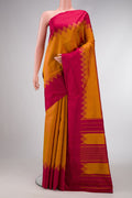 Mustard Dual Tone Kanjivaram Silk Saree with Plain Body and Fancy Border.  displayed on a mannequin