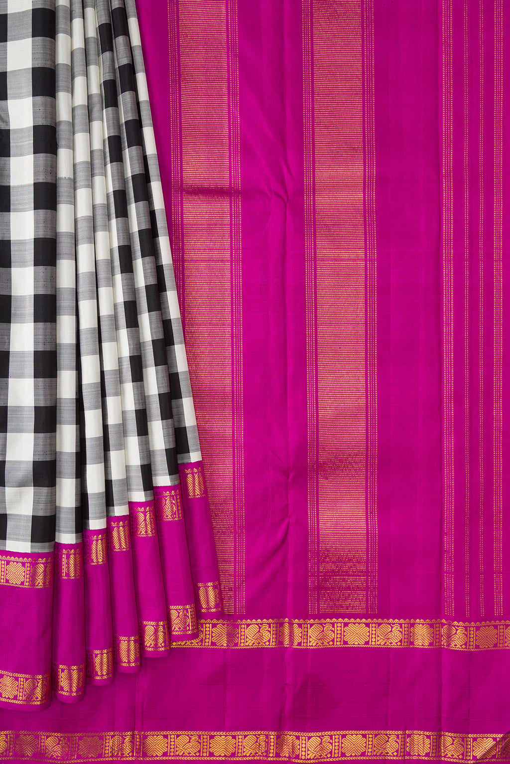 Pleats and pallu of White and Black Color Kanjivaram Silk Saree with Checked design on the body and Zari Border. 