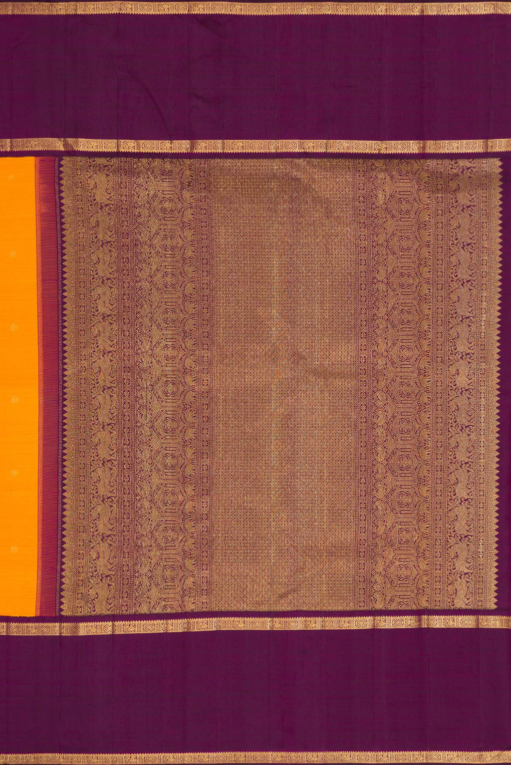 Close up image of the pallu of Mustard Dual Tone Kanjivaram Silk Saree with Zari Butta on the body and Zari Border. 