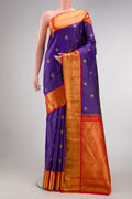 Royal Blue Dual Tone Kanchipuram Silk Saree with Checked design on the body and Zari Border.  displayed on a mannequin