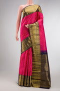 Pink Dual Tone Kanchipuram Silk Saree with Zari Butta on the body and Zari Border.  displayed on a mannequin