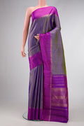 Blue Dual Tone Kanjivaram Silk Saree with Checked design on the body and Zari Border.  displayed on a mannequin