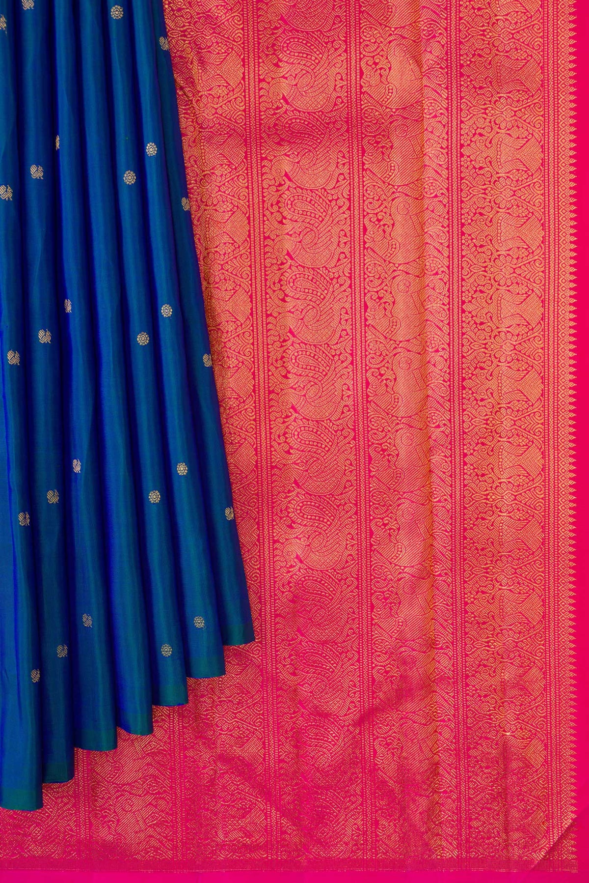 Pleats and pallu of Peacock Blue Dual Tone Kanjivaram Silk Saree with Zari Butta on the body and Without Border. 