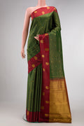 Bottle Green Dual Tone Kanjivaram Silk Saree with Checked design on the body and Fancy Border.  displayed on a mannequin