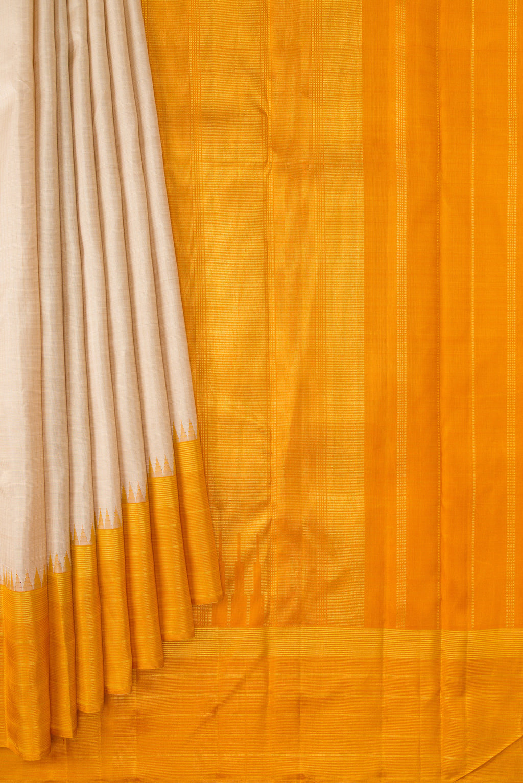 Pleats and pallu of Beige Kanjivaram Silk Saree with Checked design on the body and Plain Border. 
