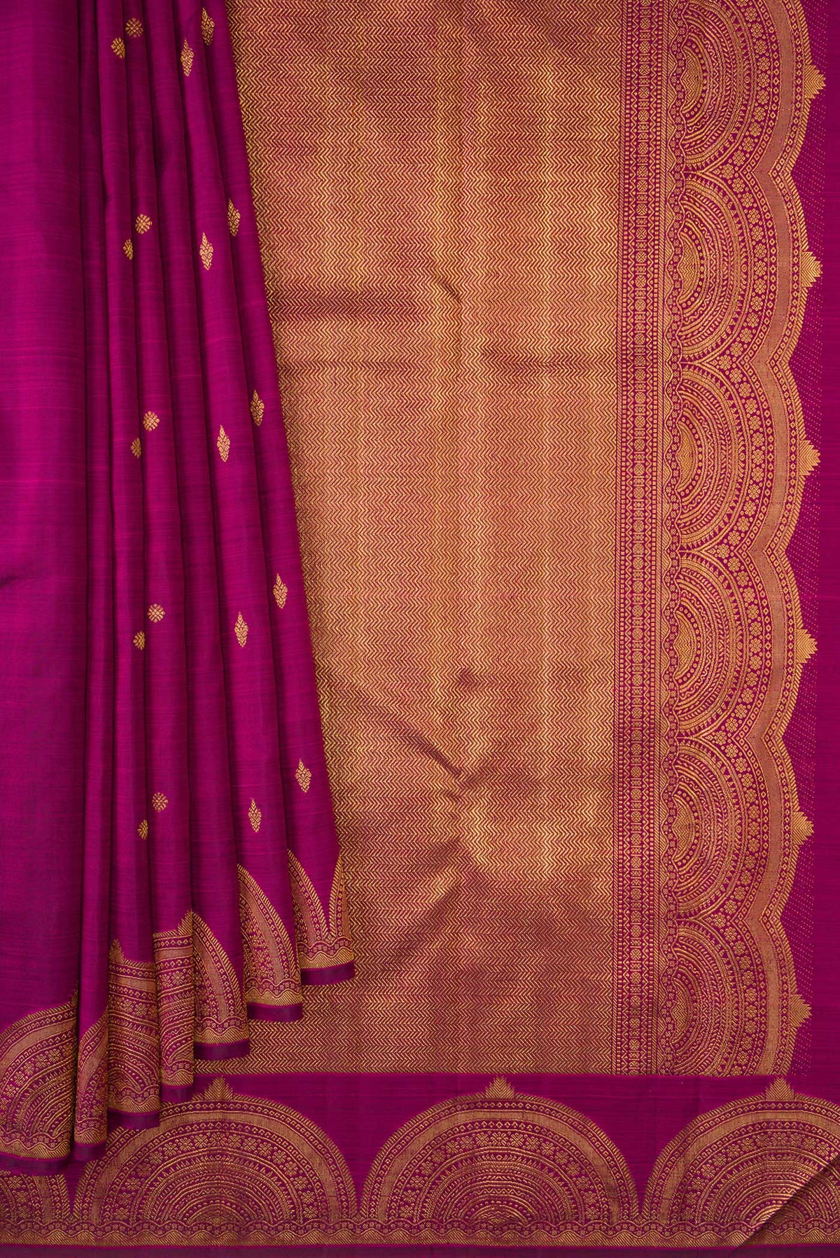 Pleats and pallu of Magenta Dual Tone Kanjivaram Silk Saree with Zari Butta on the body and Fancy Border. 