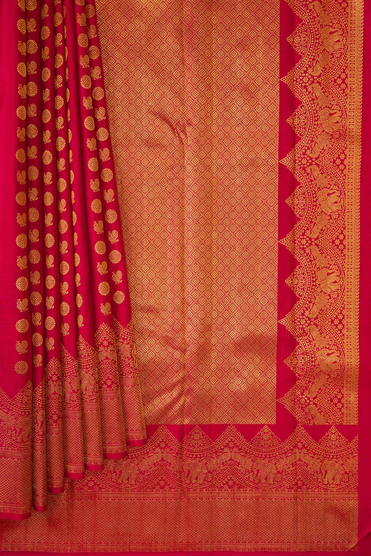 Pleats and pallu of Maroon Kanjivaram Silk Saree with Zari Butta on the body and Fancy Border. 