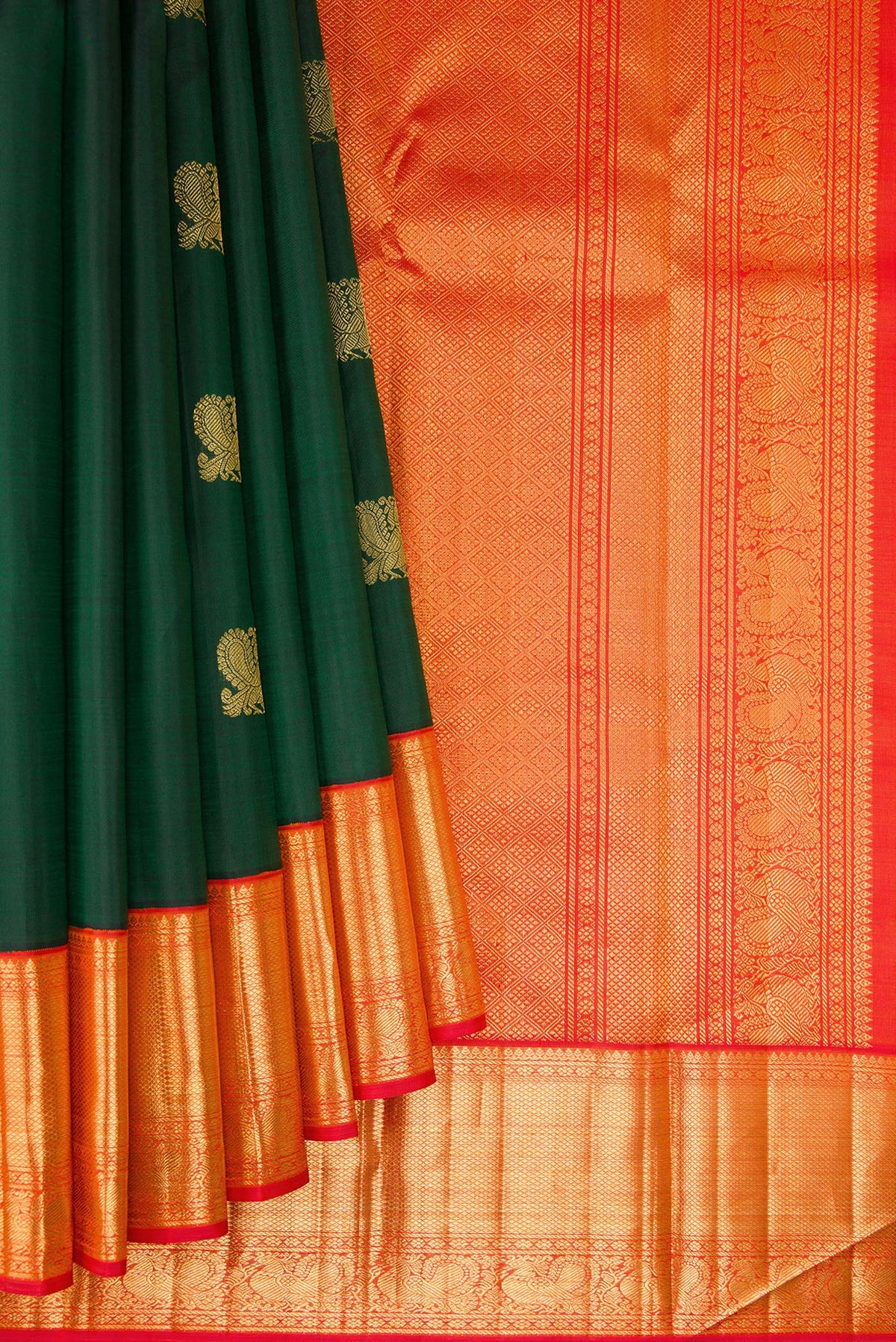 Pleats and pallu of Green Dual Tone Kanchipuram Silk Saree with Zari Butta on the body and Zari Border. 