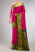 Pink Dual Tone Kanchipuram Silk Saree with Zari Butta on the body and Zari Border.  displayed on a mannequin