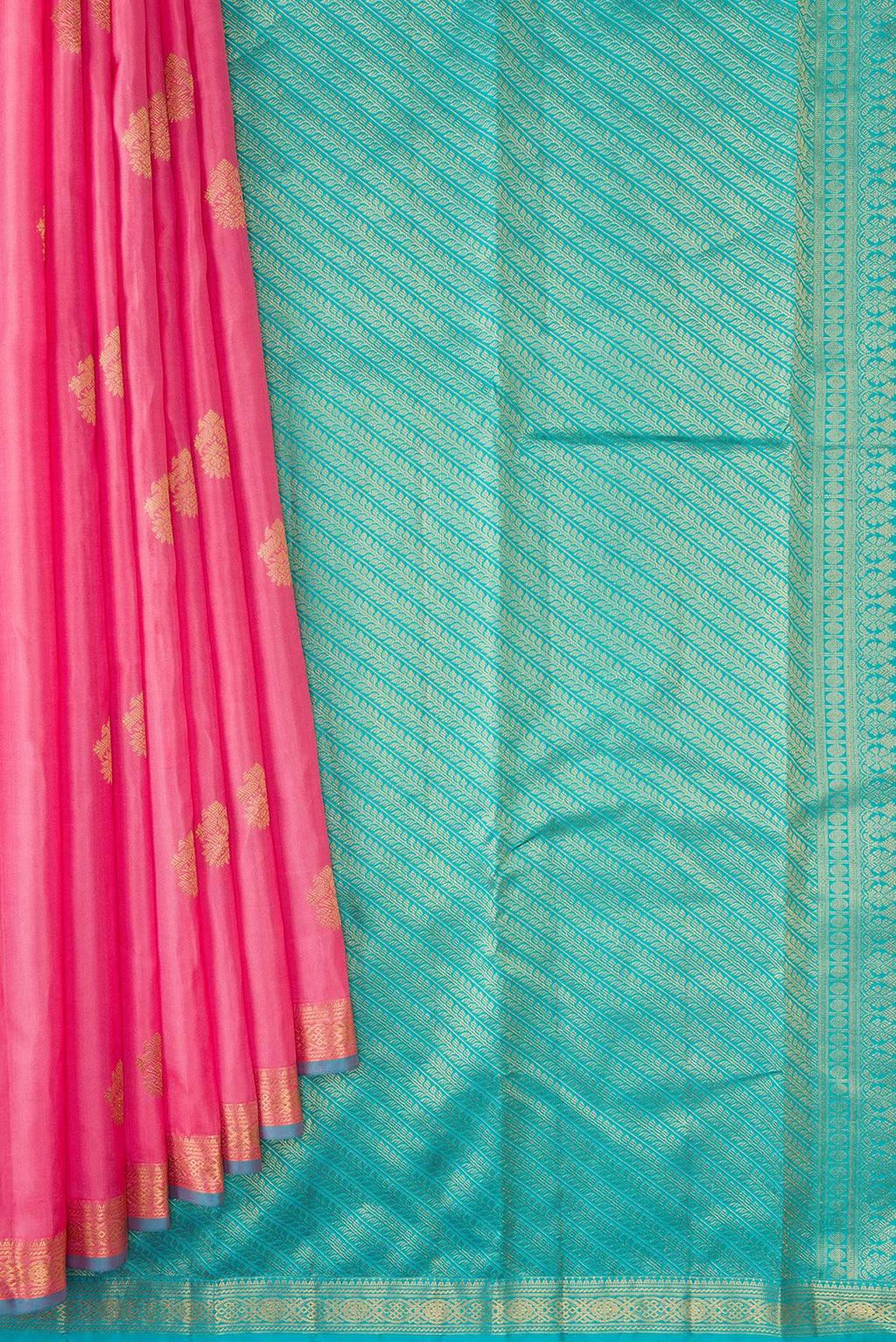 Pleats and pallu of Pink Kanchipuram Silk Saree with Zari Butta on the body and Zari Border. 
