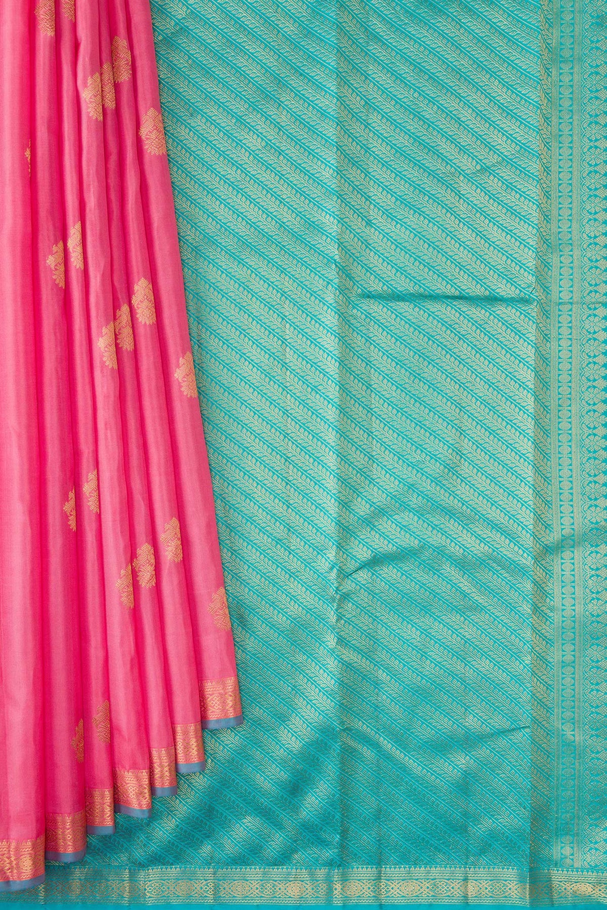Pleats and pallu of Pink Kanchipuram Silk Saree with Zari Butta on the body and Zari Border. 