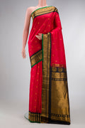 Red Dual Tone Gadwal Silk Saree with Zari Butta on the body and Zari Border.  displayed on a mannequin
