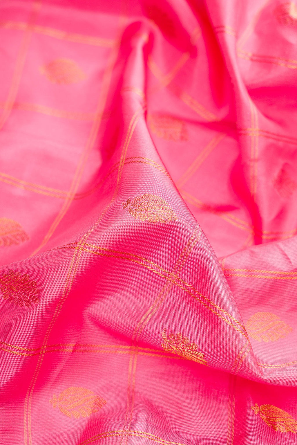 Close up of Pink Dual Tone Gadwal Silk Saree with Checked design on the body and Zari Border.  displaying folds
