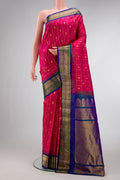 Pink Dual Tone Gadwal Silk Saree with Checked design on the body and Temple Border.  displayed on a mannequin