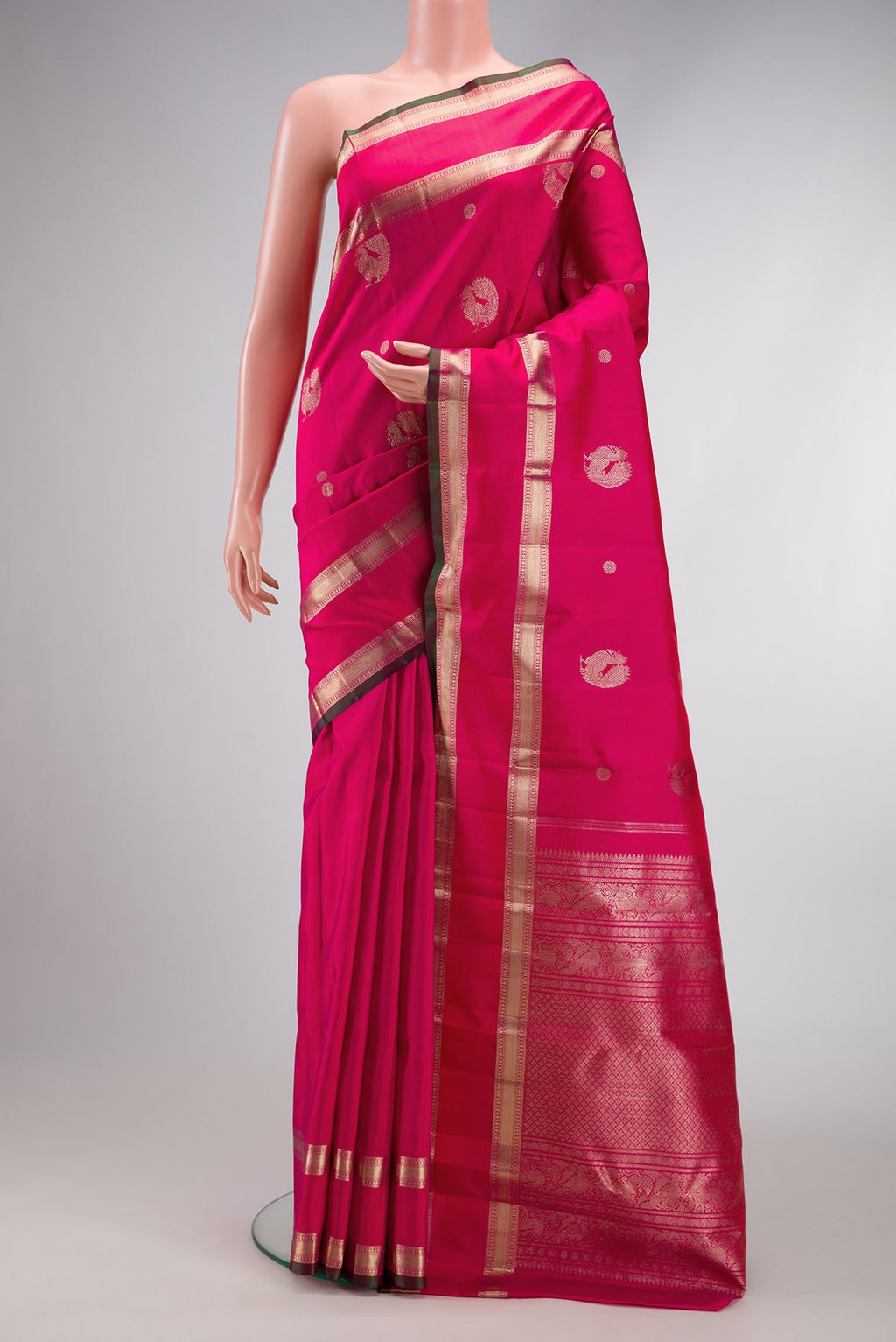 Pink Dual Tone Kanjivaram Silk Saree with Zari Butta on the body and Zari Border.  displayed on a mannequin