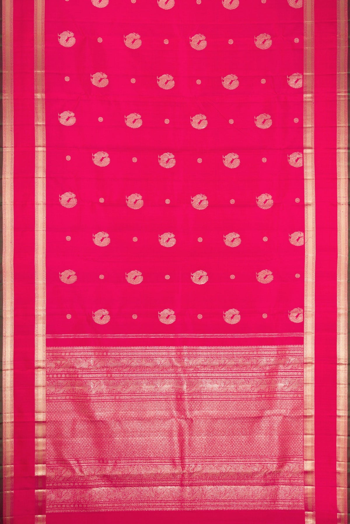 Flat view of Pink Dual Tone Kanjivaram Silk Saree with Zari Butta on the body and Zari Border. 