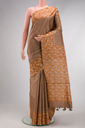 Brown Dual Tone Tussar Silk Saree with Checked design on the body and Printed Border.  displayed on a mannequin
