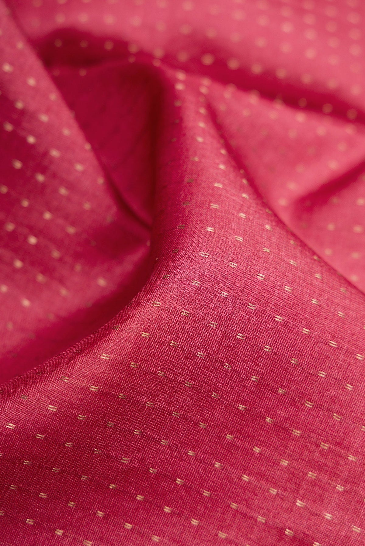 Close up of Maroon Dual Tone Tussar Silk Saree with Stripes on the body and Printed Border.  displaying folds