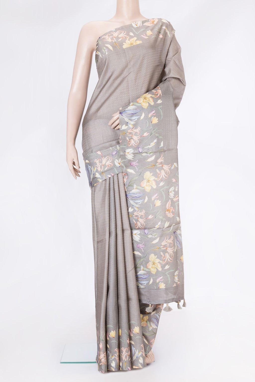 Grey Dual Tone Tussar Silk Saree with Stripes on the body and Printed Border.  displayed on a mannequin