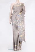 Grey Dual Tone Tussar Silk Saree with Stripes on the body and Printed Border.  displayed on a mannequin
