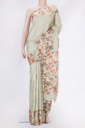 Pista Green Dual Tone Tussar Silk Saree with Stripes on the body and Printed Border.  displayed on a mannequin