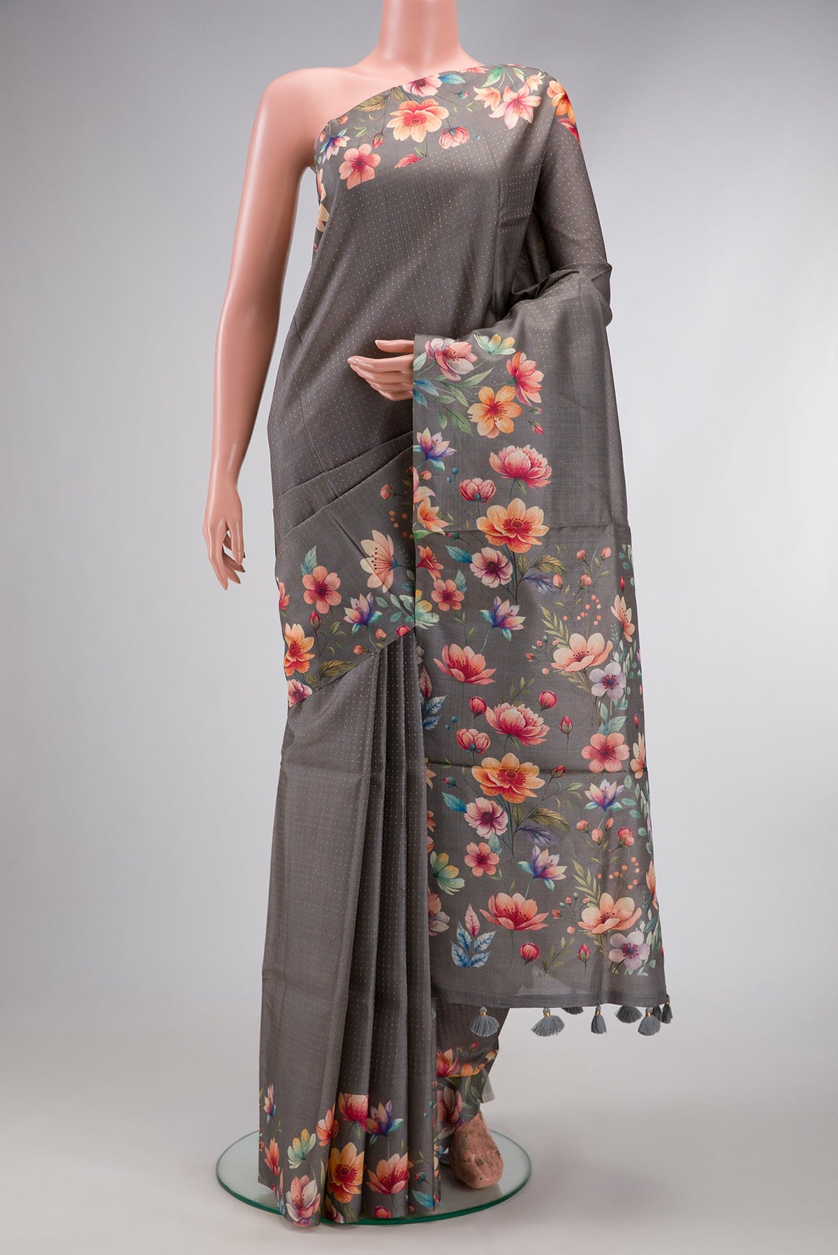 Grey Dual Tone Tussar Silk Saree with Stripes on the body and Printed Border.  displayed on a mannequin