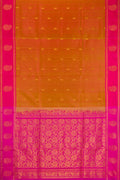 Brick Orange Dual Tone Soft Silk Saree with Zari Butta on the body and Fancy Border.  displayed on a mannequin