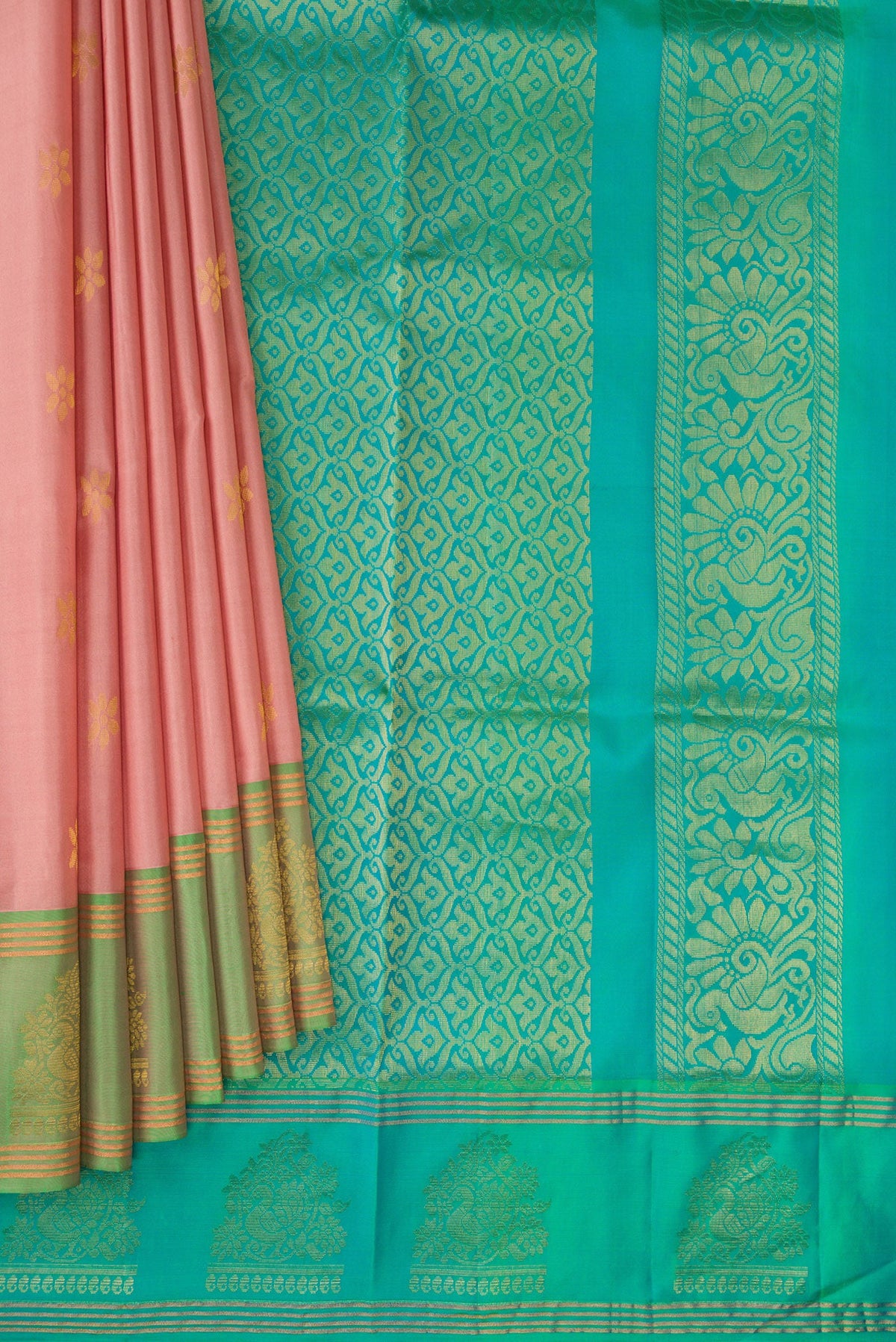 Pleats and pallu of Rose Gold Soft Silk Saree with Zari Butta on the body and Fancy Border. 
