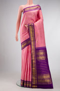 Pink Dual Tone Kanchipuram Silk Saree with Zari Butta on the body and Zari Border.  displayed on a mannequin