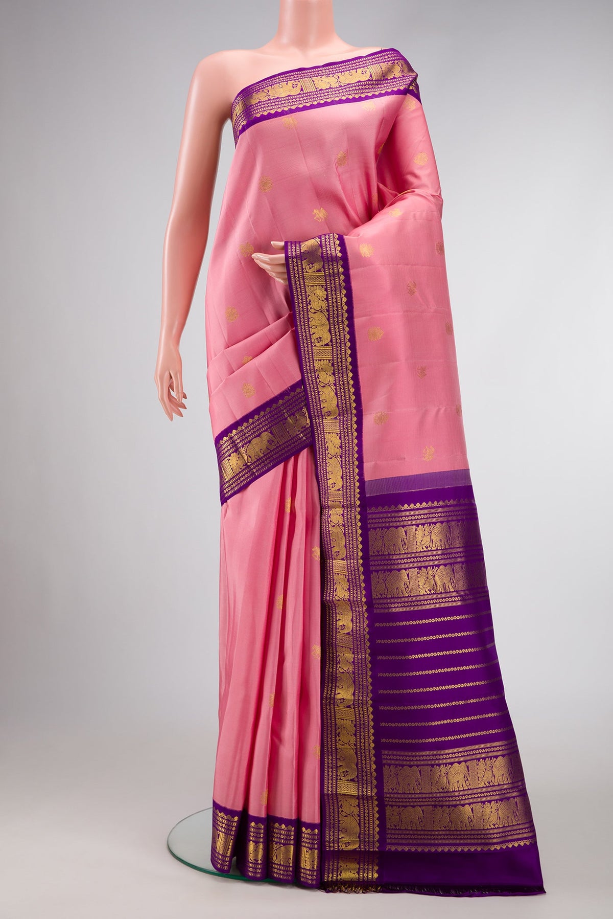 Pink Dual Tone Kanchipuram Silk Saree with Zari Butta on the body and Zari Border.  displayed on a mannequin