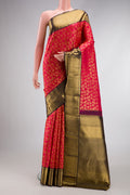 Dark Pink Dual Tone Kanchipuram Silk Saree with Zari Brocade on the body and Zari Border.  displayed on a mannequin