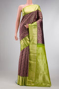 Magenta Dual Tone Kanchipuram Silk Saree with Zari Brocade on the body and Zari Border.  displayed on a mannequin