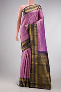 Lavender Dual Tone Kanchipuram Silk Saree with Zari Brocade on the body and Zari Border.  displayed on a mannequin