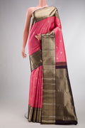 Pink Dual Tone Kanchipuram Silk Saree with Checked design on the body and Zari Border.  displayed on a mannequin