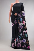 Black Crepe Saree with Plain Body and Printed Border.  displayed on a mannequin