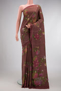 Brown Dual Tone Mysore Crepe Saree with Printed design on the body and Plain Border.  displayed on a mannequin