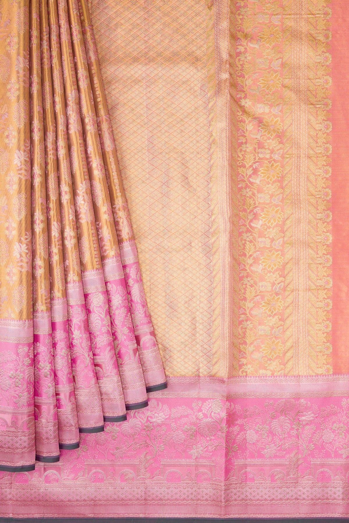 Pleats and pallu of Gold Dual Tone Kanjivaram Tissue Silk Saree with Zari Brocade on the body and Zari Border. 