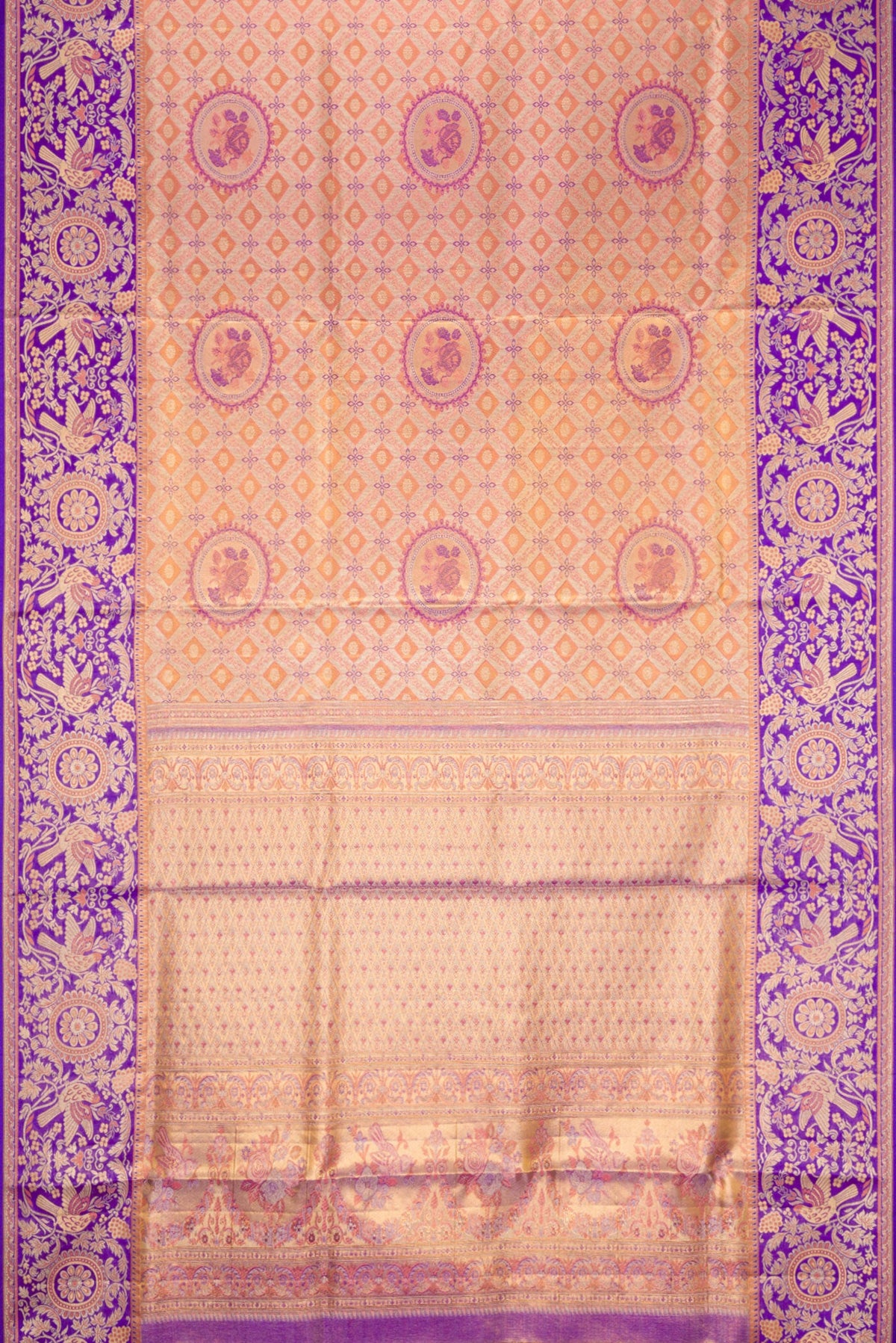 Flat view of Peach Dual Tone Kanjivaram Tissue Silk Saree with Zari Brocade on the body and Fancy Border. 