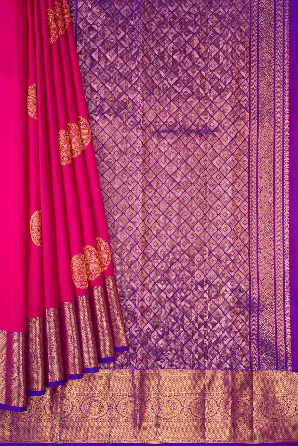 Pleats and pallu of Dark Pink Dual Tone Kanjivaram Silk Saree with Zari Butta on the body and Zari Border. 