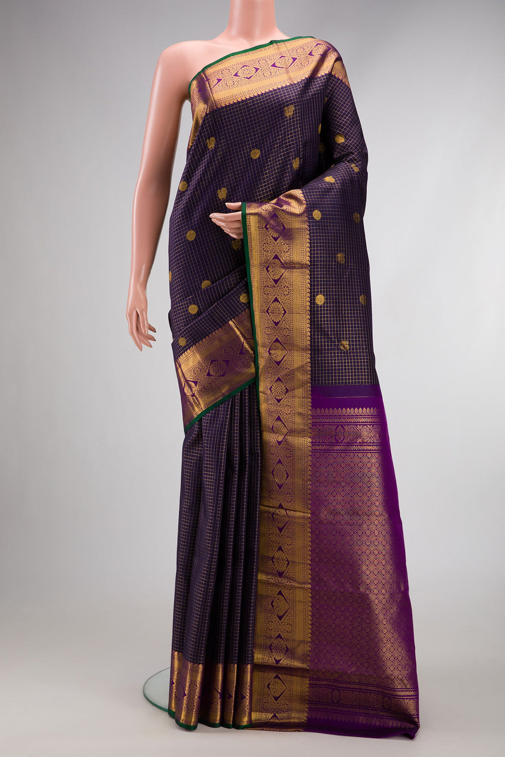 Navy Blue Dual Tone Kanjivaram Silk Saree with Checked design on the body and Zari Border.  displayed on a mannequin