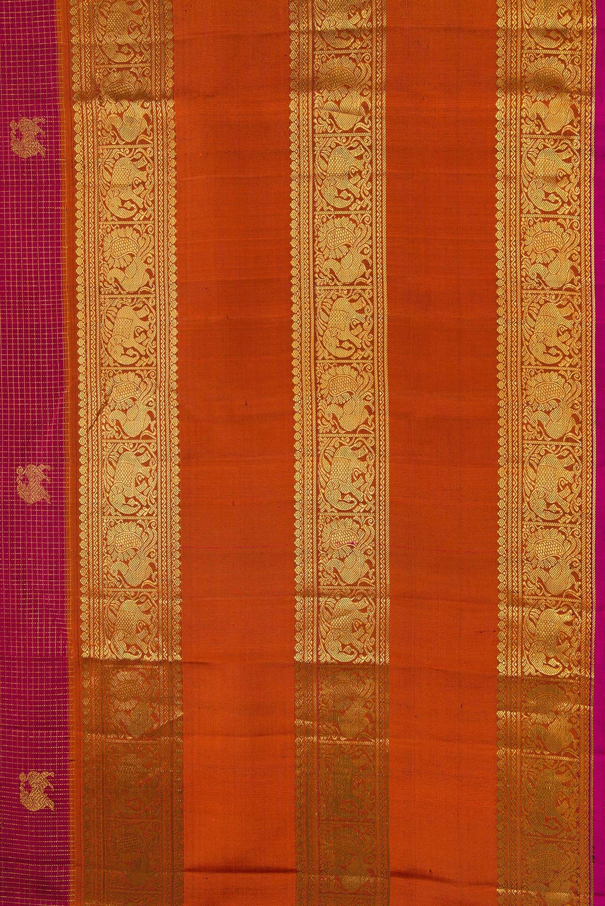 Border image of Maroon Kanjivaram Silk Saree with Zari Butta on the body and Zari Border. 