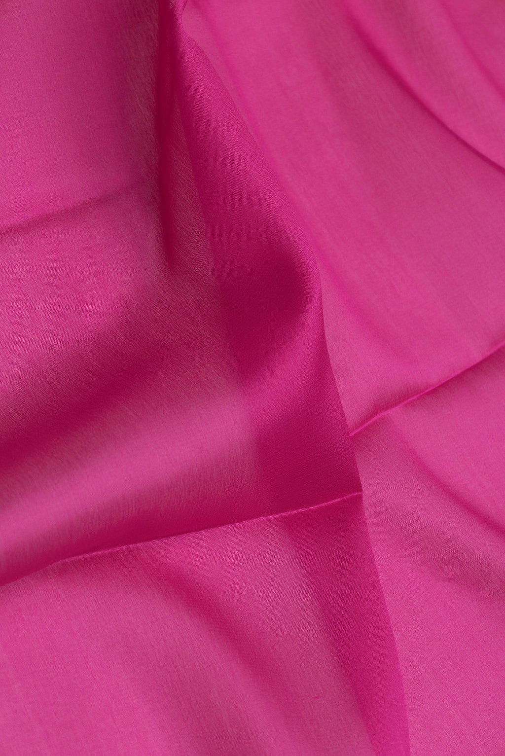 Close up of Magenta Dual Tone Mysore Silk Saree with Plain Body and Zari Border.  displaying folds