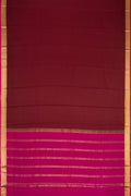 Brown Dual Tone Mysore Crepe Saree with Plain Body and Zari Border.  displayed on a mannequin