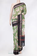 Mehandi Green Dual Tone Chanderi Silk Saree with Printed design on the body and Zari Border.  displayed on a mannequin