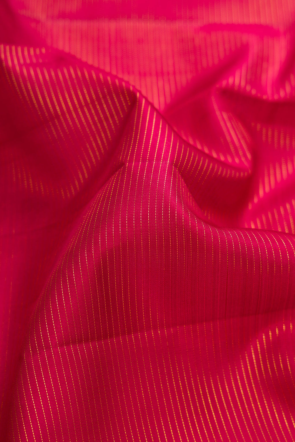 Close up of Pure Silk Pure Zari Maroon Dual Tone Kanchipuram Nine Yards Saree with Stripes on the body and Zari Border.  displaying folds