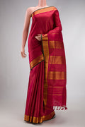 Pure Silk Pure Zari Maroon Dual Tone Kanchipuram Nine Yards Saree with Stripes on the body and Zari Border.  displayed on a mannequin